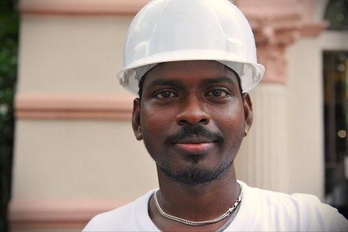 Singapore,-,May,10:,A,Migrant,Worker,Poses,For,A Photograph - Racial Discrimination Lawyer in Rochester, NY The Cimino Law Firm