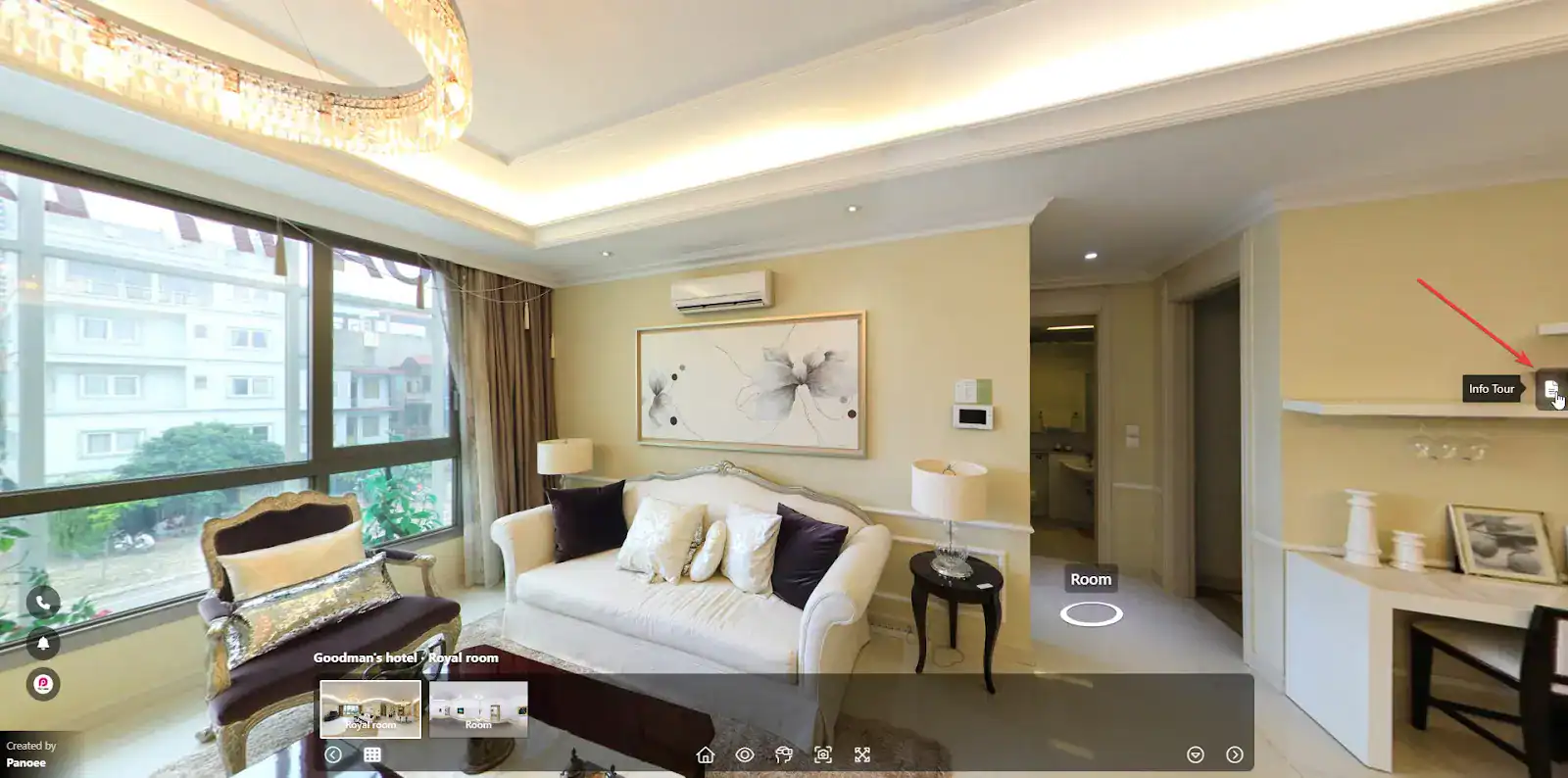 Luxurious hotel living room with large windows, elegant furniture, modern decor, and soft ambient lighting for a cozy yet sophisticated atmosphere.