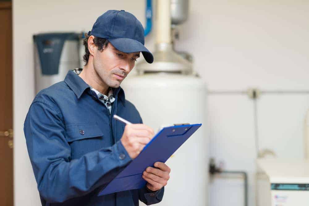 Home Inspector logging details of a house