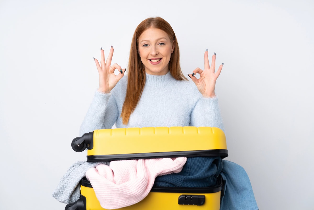how to pack sweaters in a suitcase