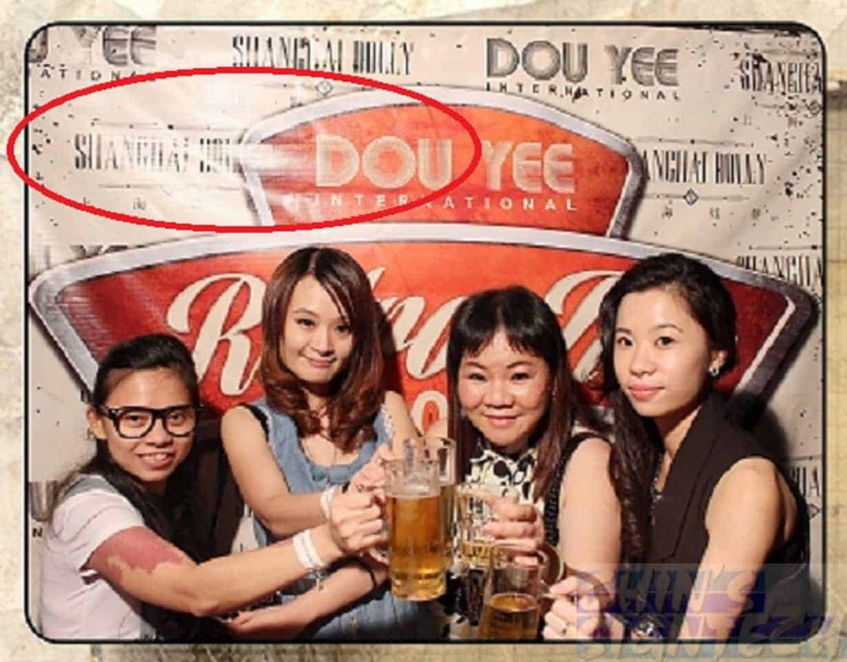 reflection on photo booth backdrop with PVC banner