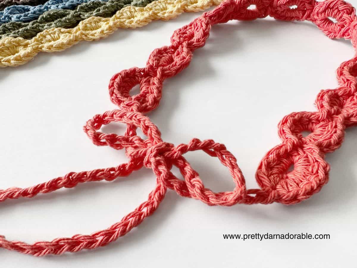 crochet coral headband with tie back