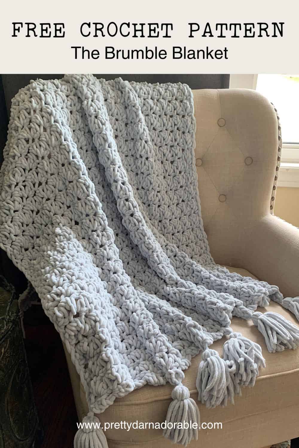grey crochet chunky blanket with tassels