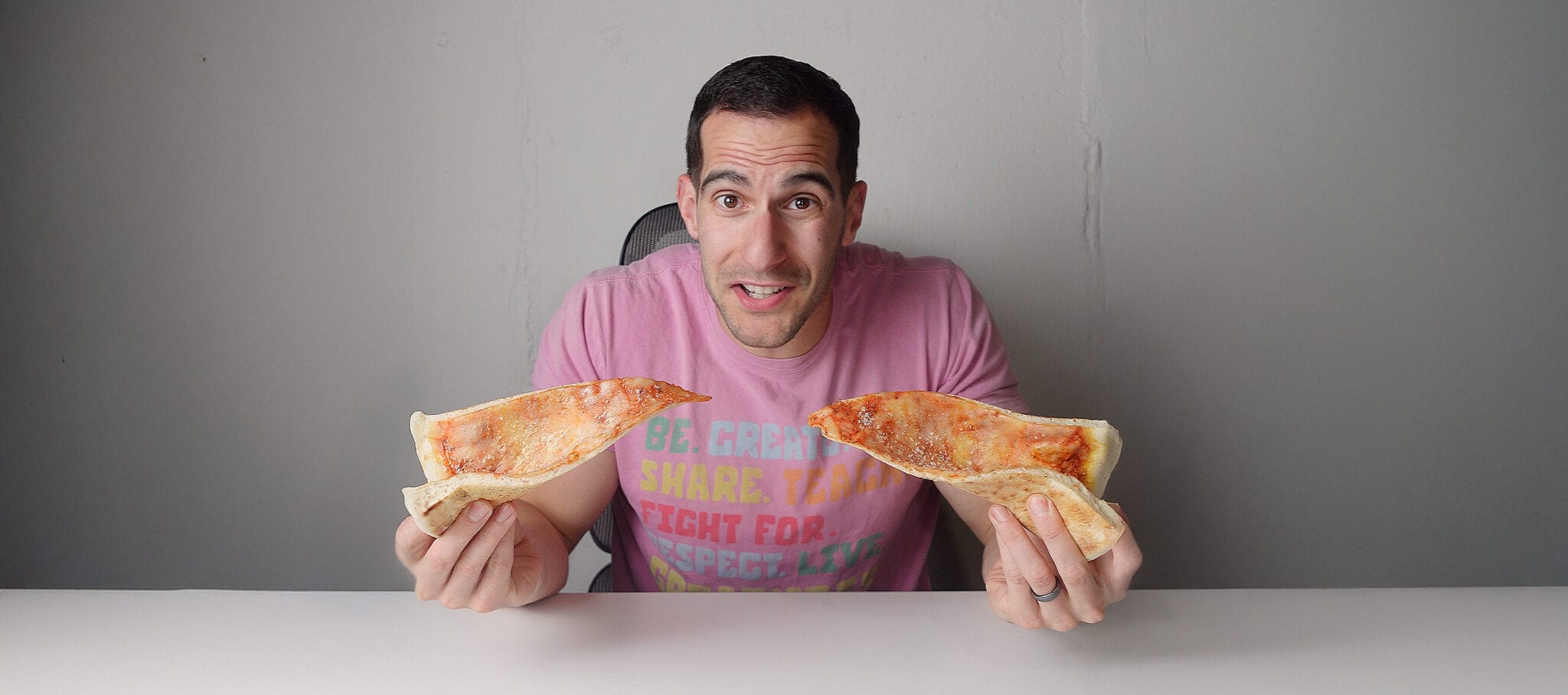 Matt Holding Pizza