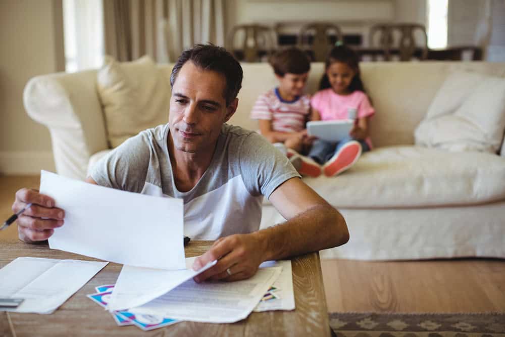 man with family needs credit card debt lawyer
