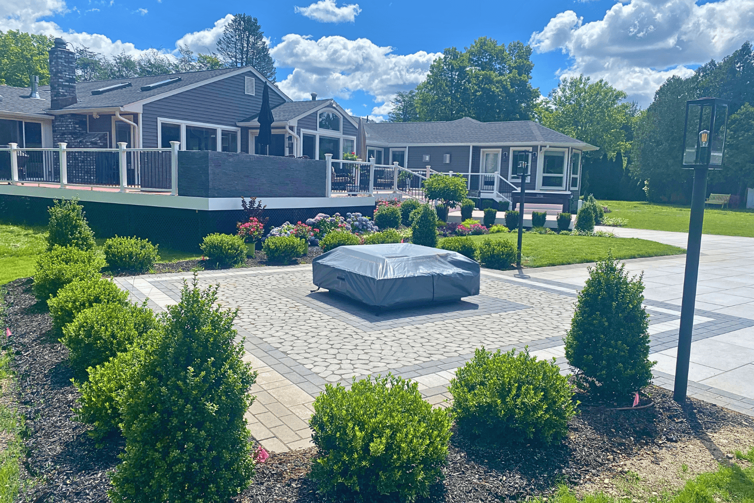 Landscaped area with covered structure