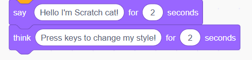 Scratch say and think blocks — Scratch Cat introduces itself and hints at available keyboard interactions