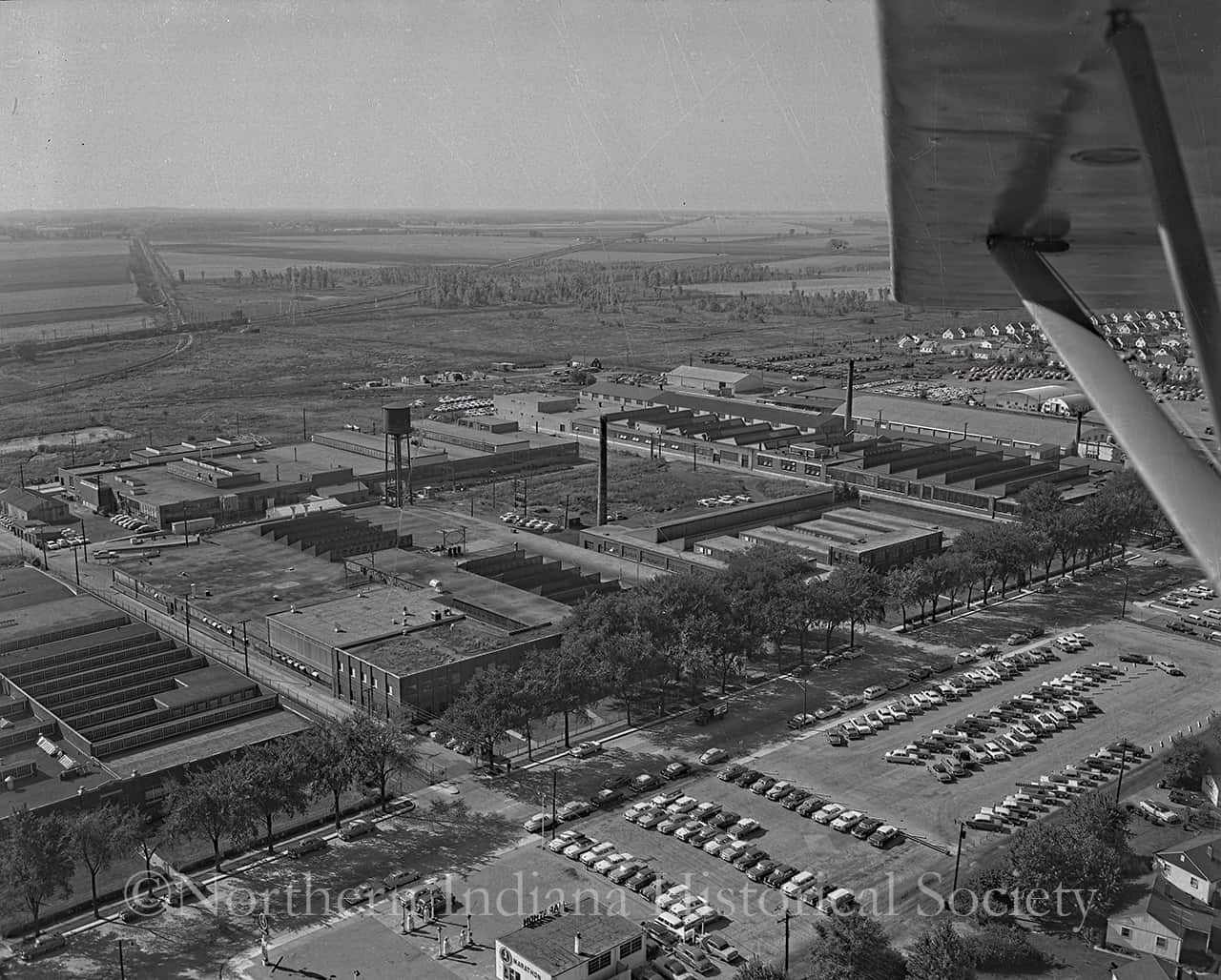 Bantam Bearings Aerial Photograph ©Northern Indiana Historical Society Aerial view of The History Museum complex with parking lots and surrounding landscape in black and white.