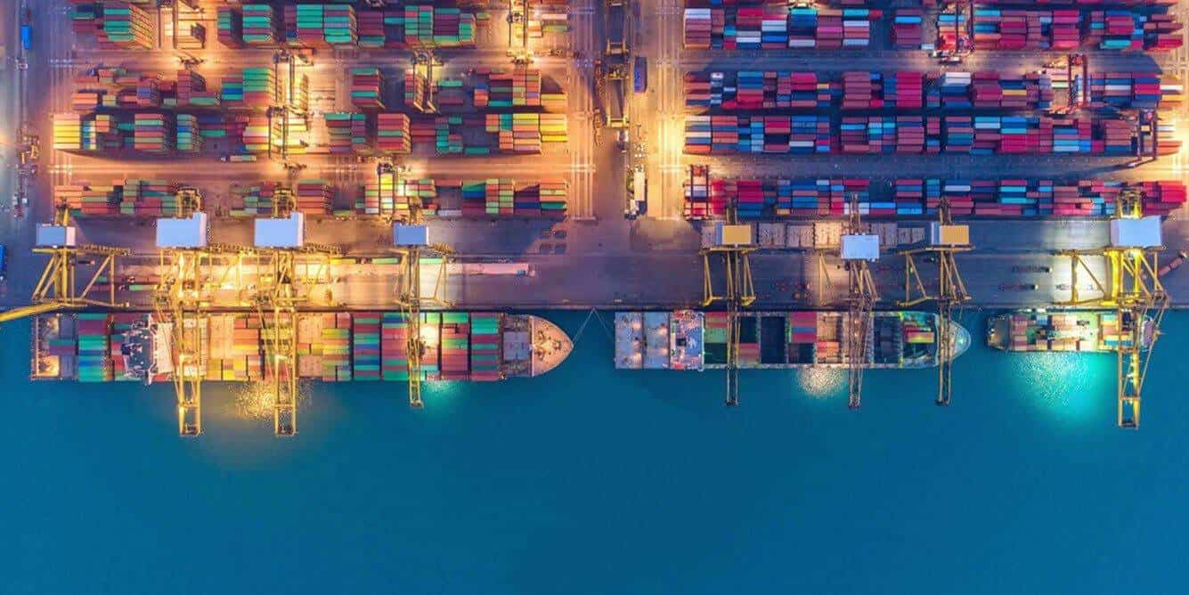 Cargo Ships at dock overhead shot of ships loading at dock - International Freight Forwarder Houston - freight forwarder houston