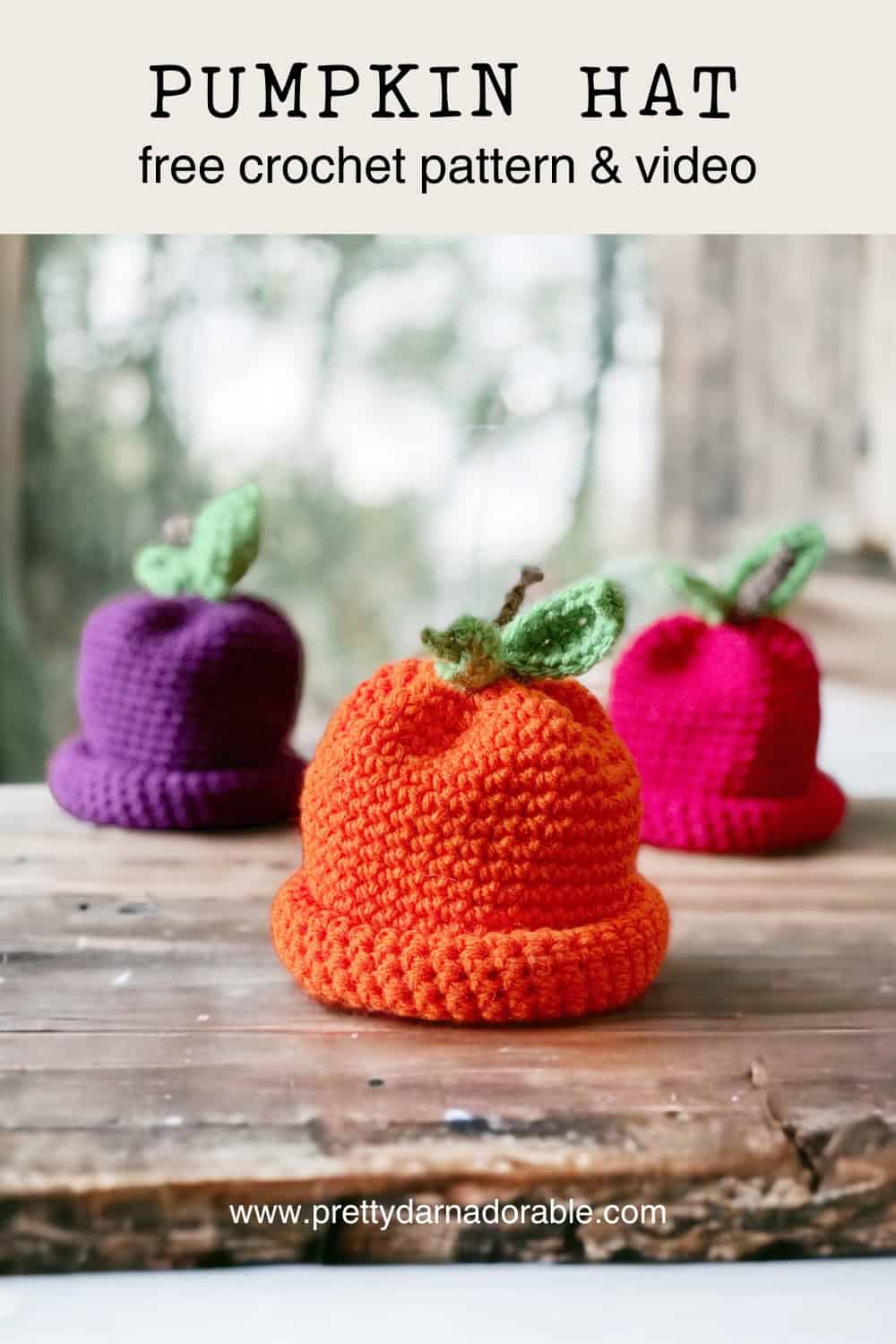 three crochet pumpkin hats in purple red and orange. Free crochet pumpkin hat pattern and video