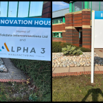 Jet washing driveway with van and branding visible