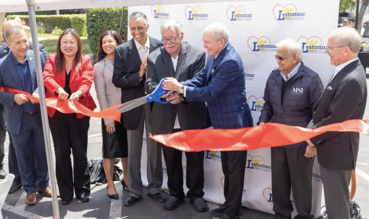 Edward Gerber and Bill Thompson cut ribbon at free surgery center launch in Orange County