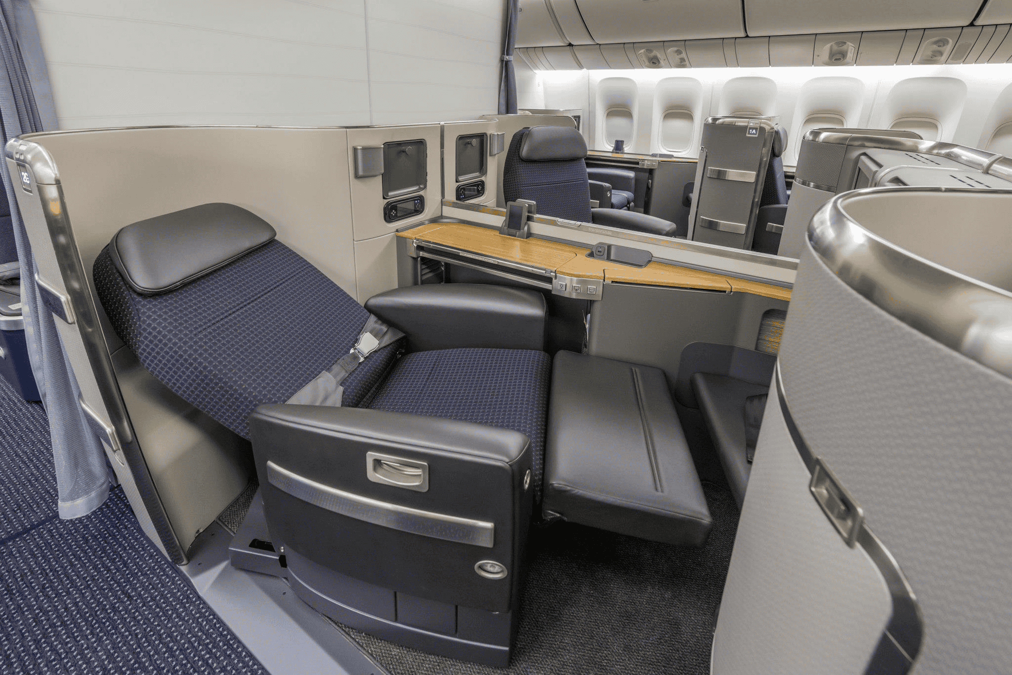 AA Systemwide Upgrades (SWUs) in AAdvantage: How They Work, Who Gets Them, How Use 1 lie-flat seats in First class