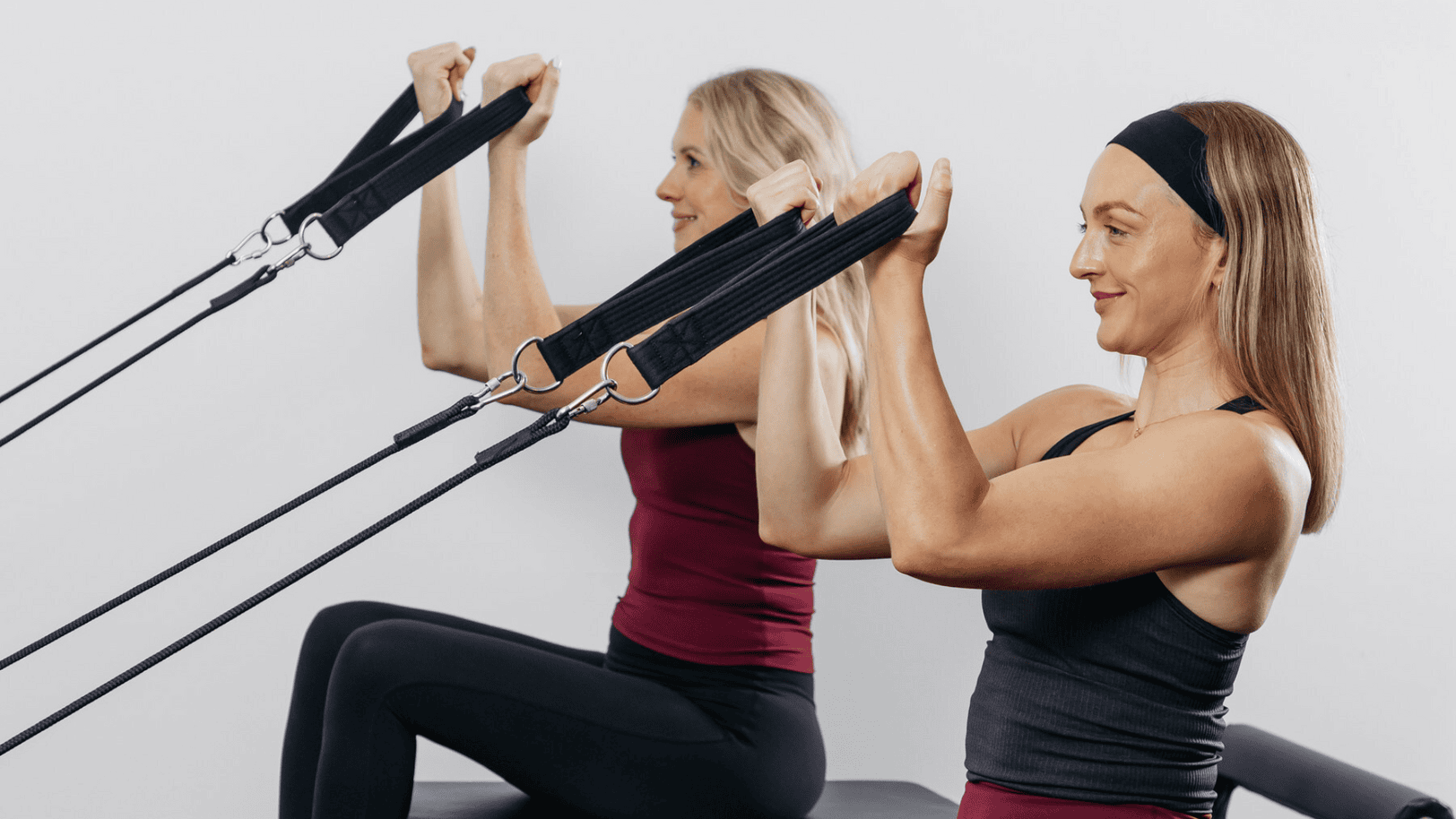 Participants complete reformer Pilates exercises as Studio Pilates introduces The Pilates Games. Image Courtesy of Studio Pilates International