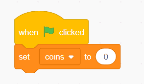 Scratch code blocks initializing coins variable to zero at game start for currency system