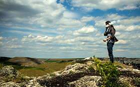 vapa_5762aaad-0228-47a6-9260-97b3652f6044 Man stood on a rock vaping