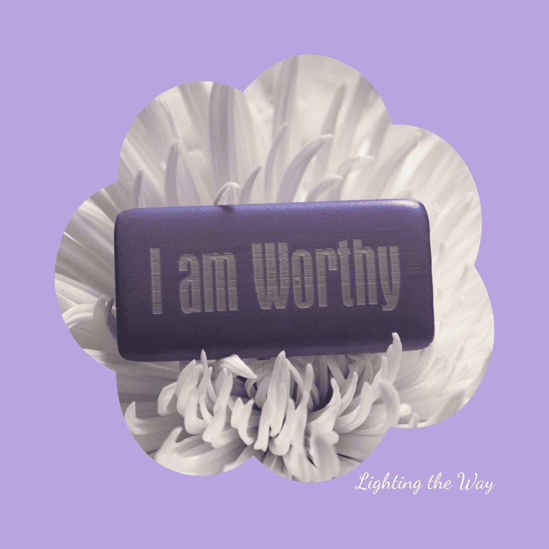 Worthy motivational message on an inside purple box, placed on a white chrysanthemum flower, with Lavender background.