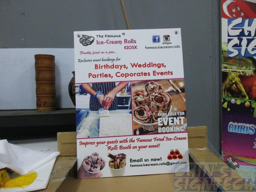 Double sided foam board with eyelets for hanging