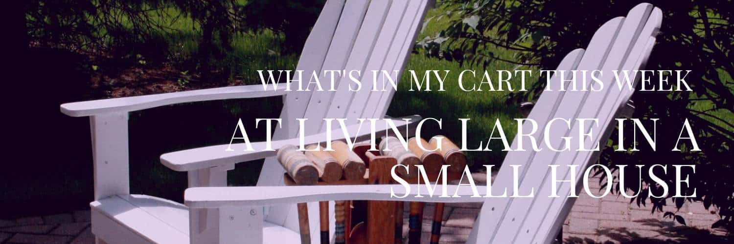 Two white wooden Adirondack chairs sit in a green outdoor area, with a small table in between them. Text over the image reads, "What's in my cart this week at Living Large in a Small House.