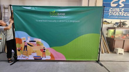 PVC banner on telescopic backdrop stand