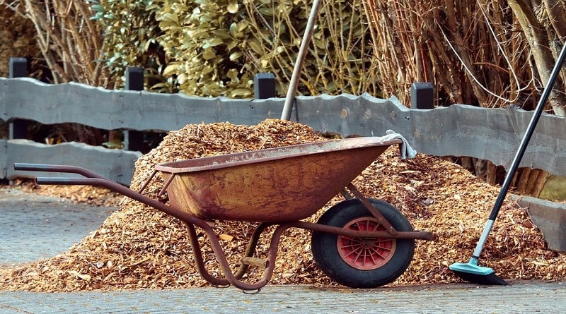 Wheelbarrow and mulch pile - Get Rid of Yard Waste