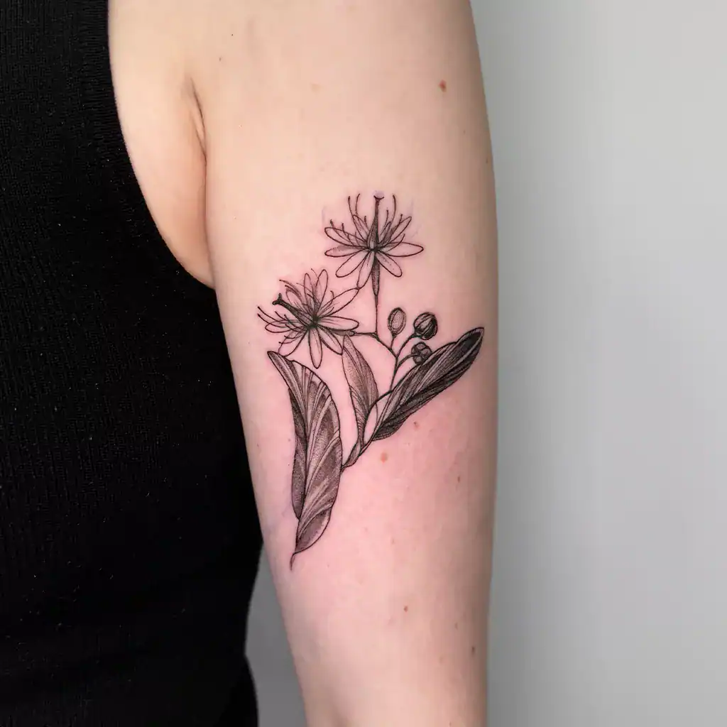 Fineline Tattoo von zarten Blümchen