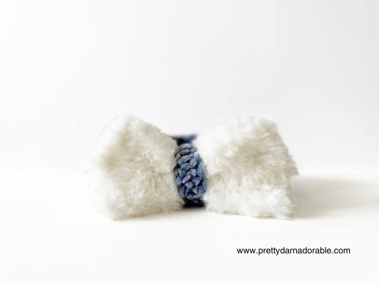 blue crochet spa headband with white fur bow