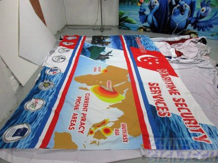 Fabric banner for shell scheme walls