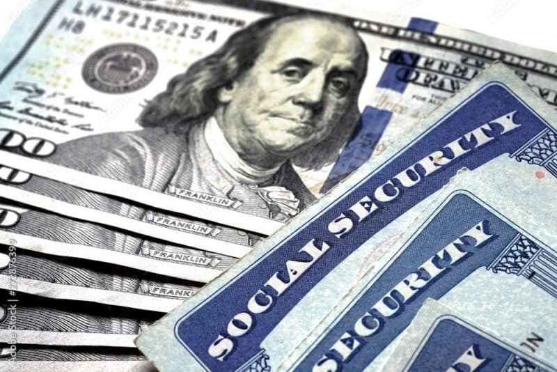 Social Security Cards in a Row Pile for Social Security delays