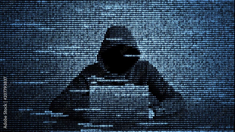 Hacker in data security concept. Hacker using laptop. Hacking the Internet. Cyber attack.