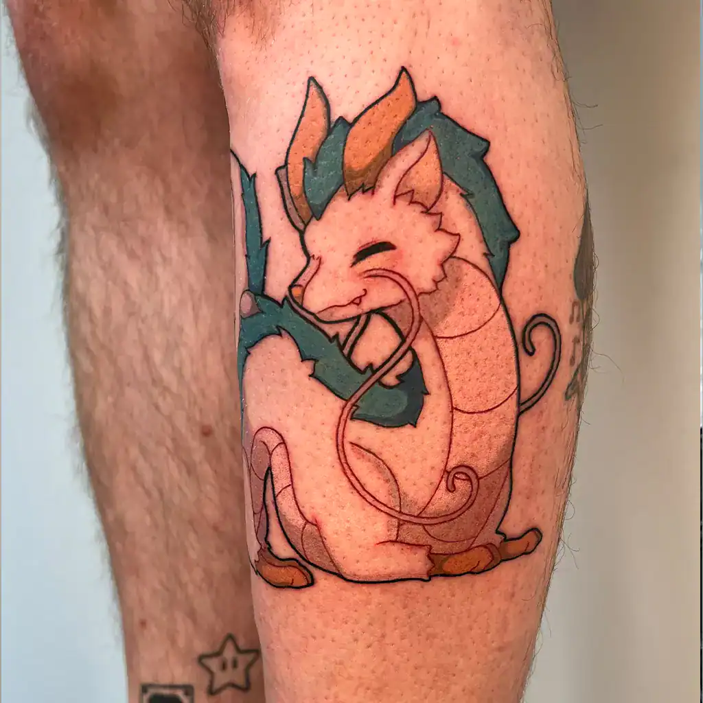 Farbiges Tattoo von Haku vom Studio Ghibli