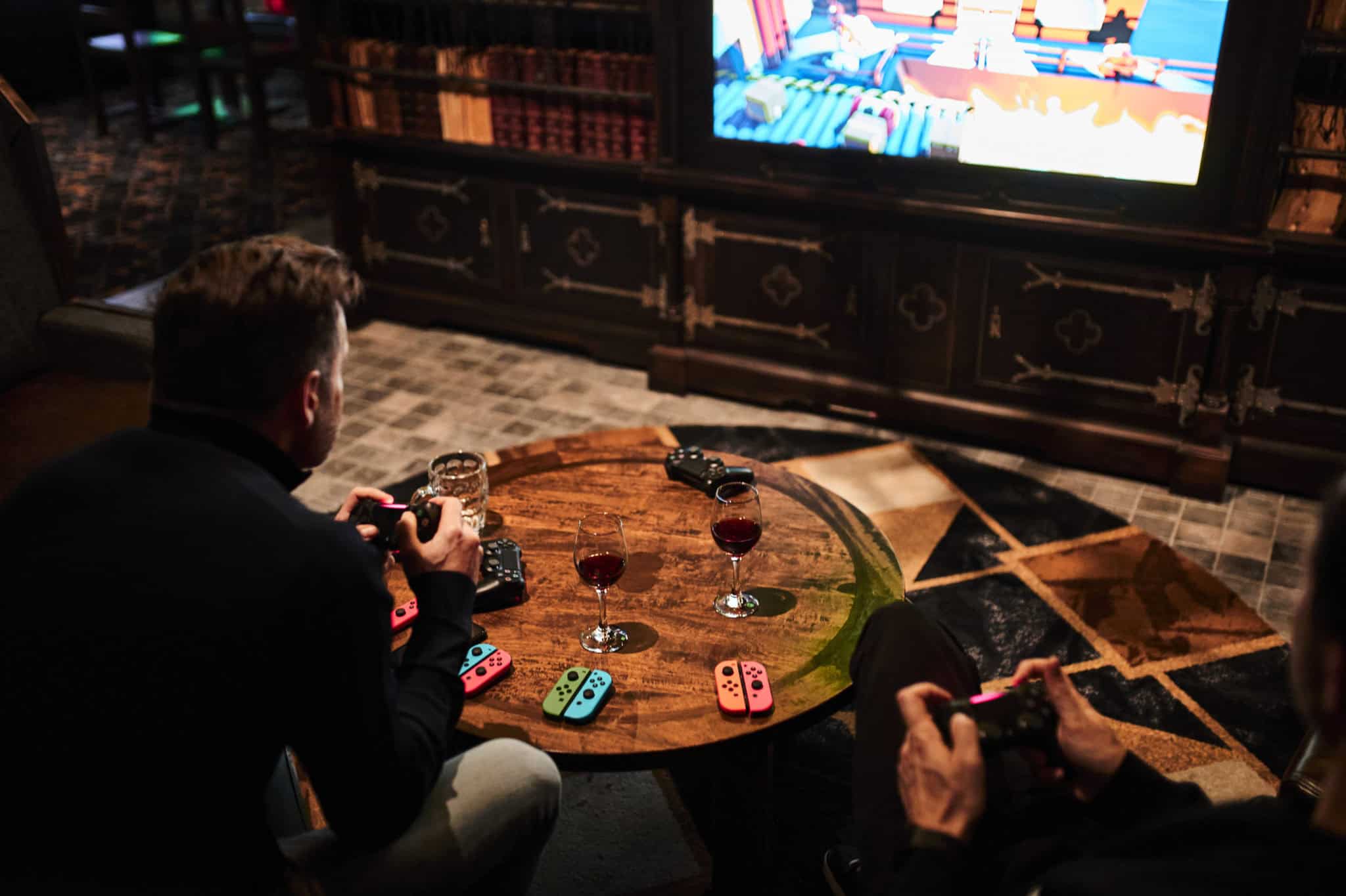 A flat screen tv sitting in front of a television playing a video game