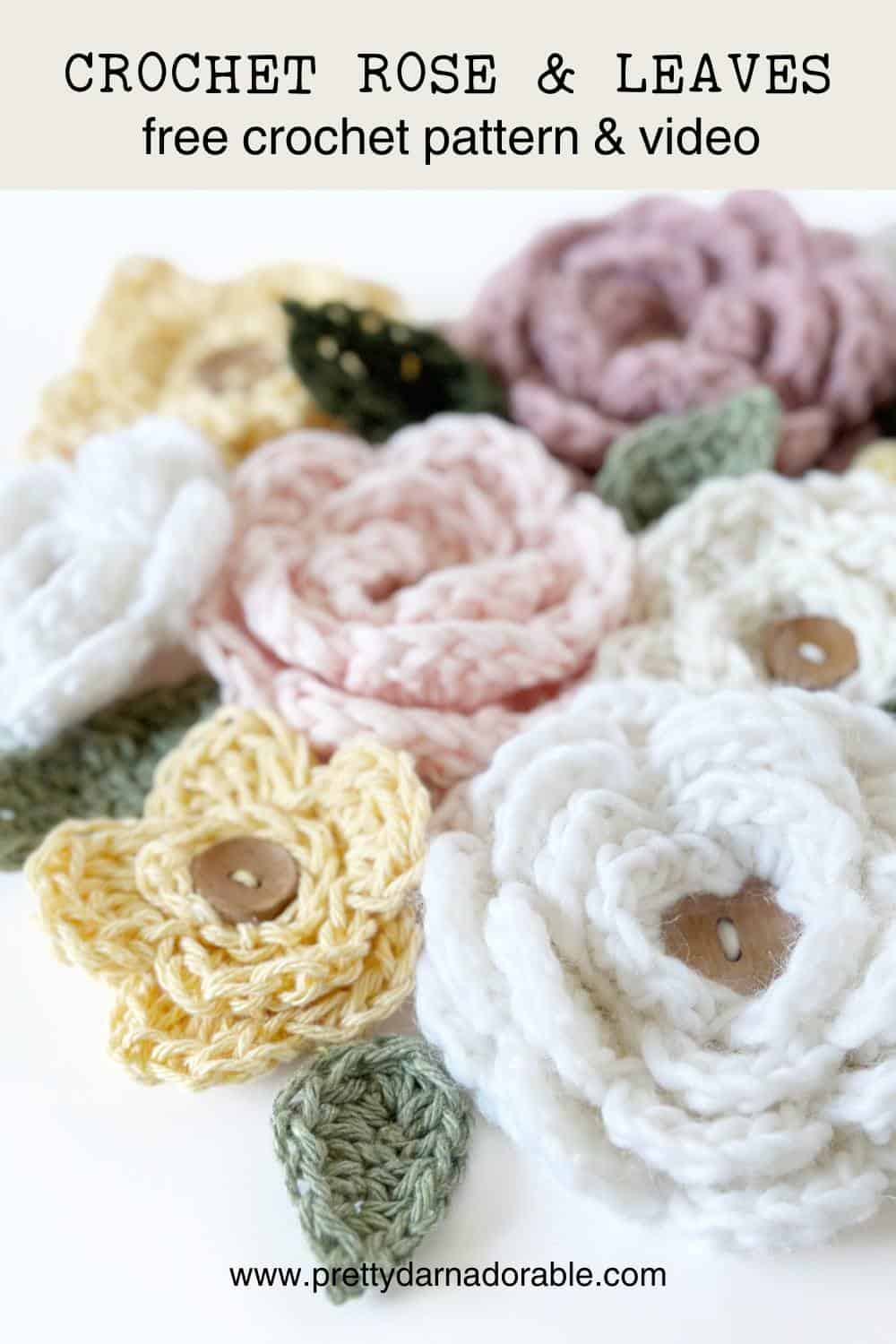 crochet roses in different colours with crochet leaves and buttons