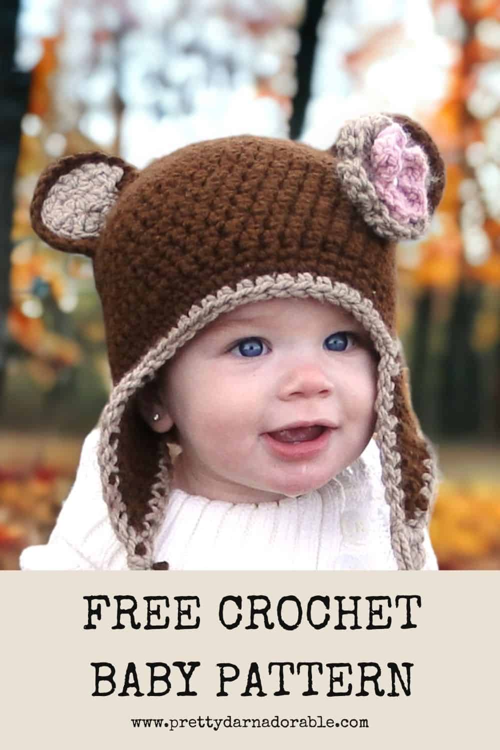 baby wearing brown crochet bear hat
