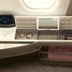 A microwave oven sitting on top of a car