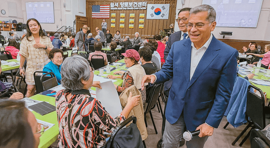 Alt textCalifornia gubernatorial candidate Xavier Becerra greets Korean American seniors at Wilshire Adult Day Health Care Center in Los Angeles Koreatown.