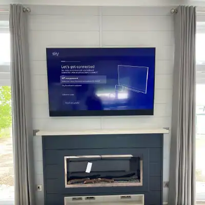 Professional TV wall mounting by Digital TV Systems Sky glass tv wall installation by Digital TV Systems