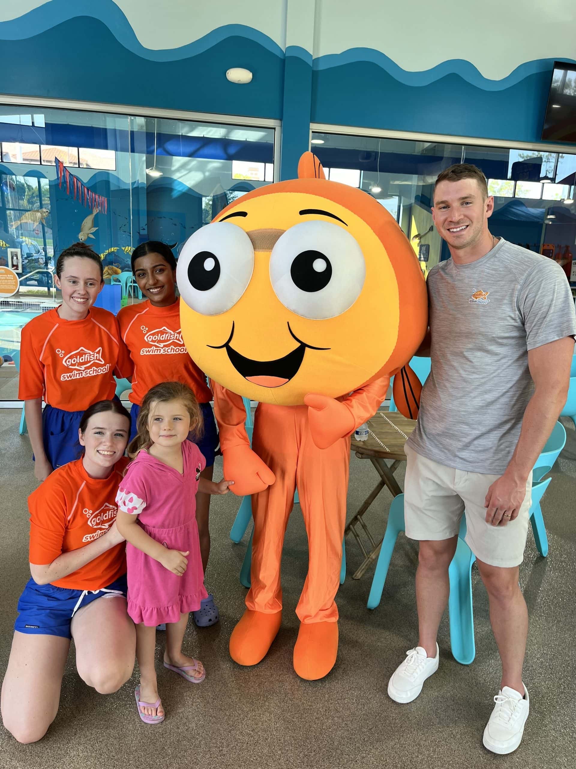 Image of Ryan Murphy, team, student and Bubbles for Goldfish Swim School
