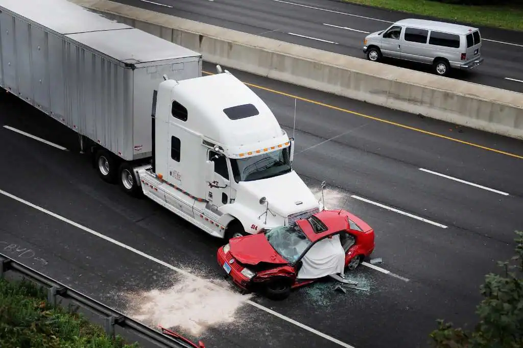 aftermath of a collision with a semitruck