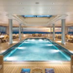 A living room filled with furniture and a large window