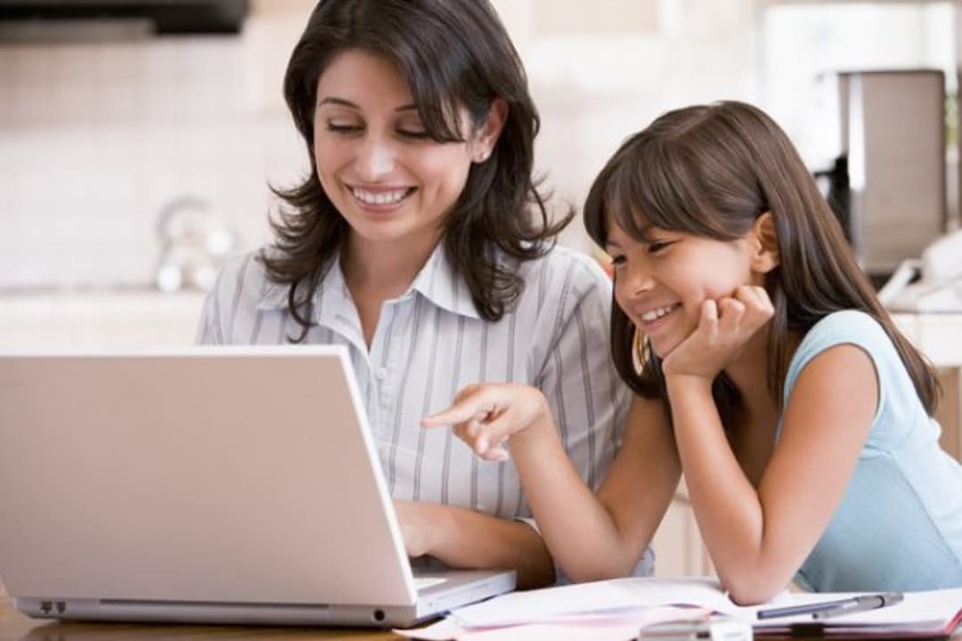 mother & daughter learning coding together