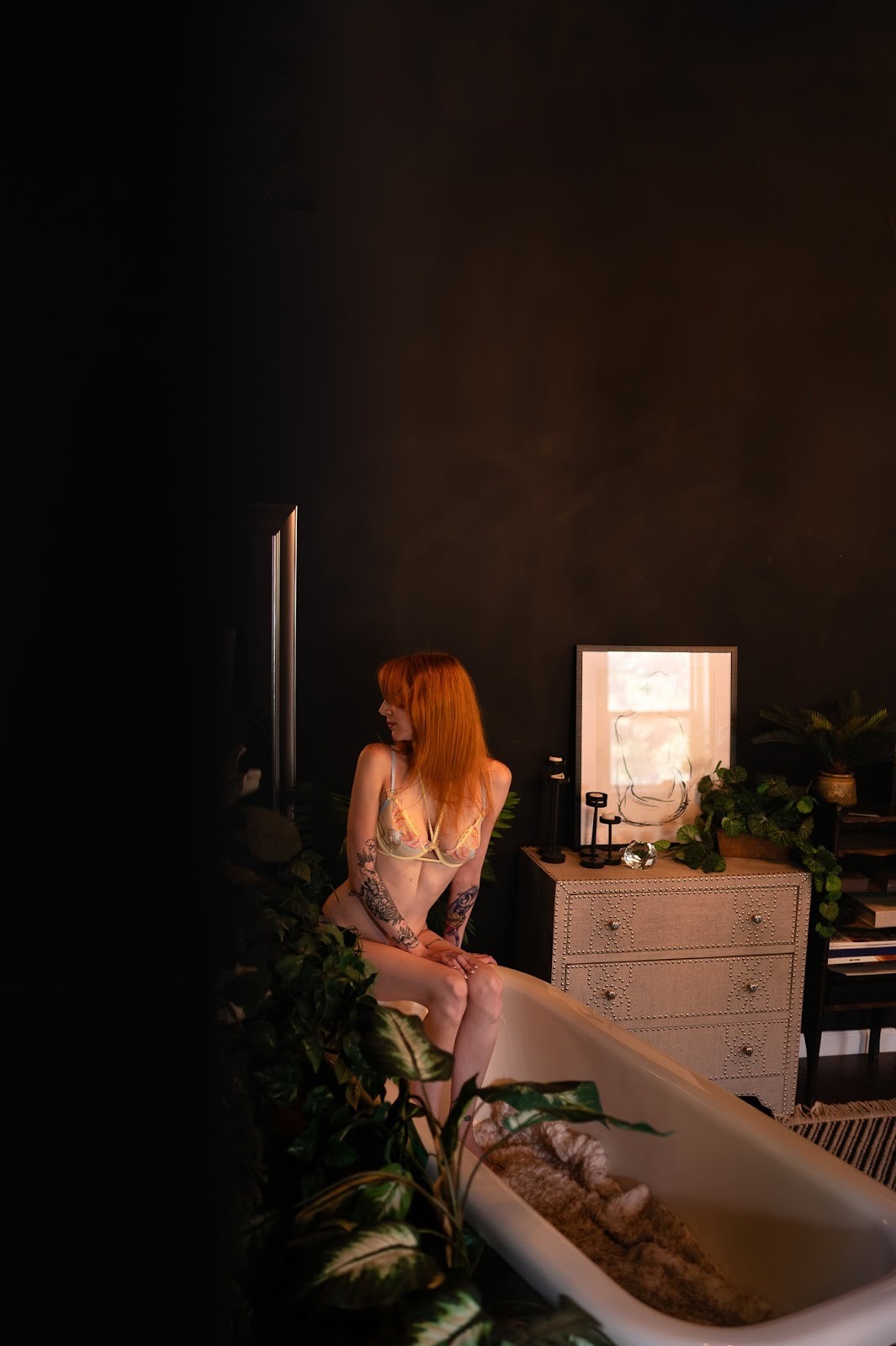 What is boudoir photography? Here is an example. This is a boudoir photograph of a beautiful red haired client of ELI Boudoir.