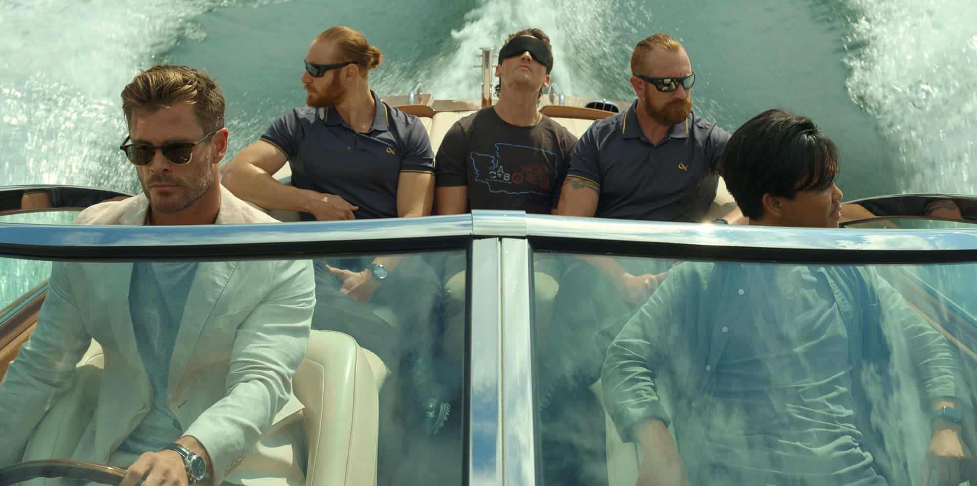 SPIDERHEAD. (L to R) Chris Hemsworth as Abnesti, Miles Teller as Jeff and Mark Paguio as Verlaine in Spiderhead. Netflix ยฉ 2022