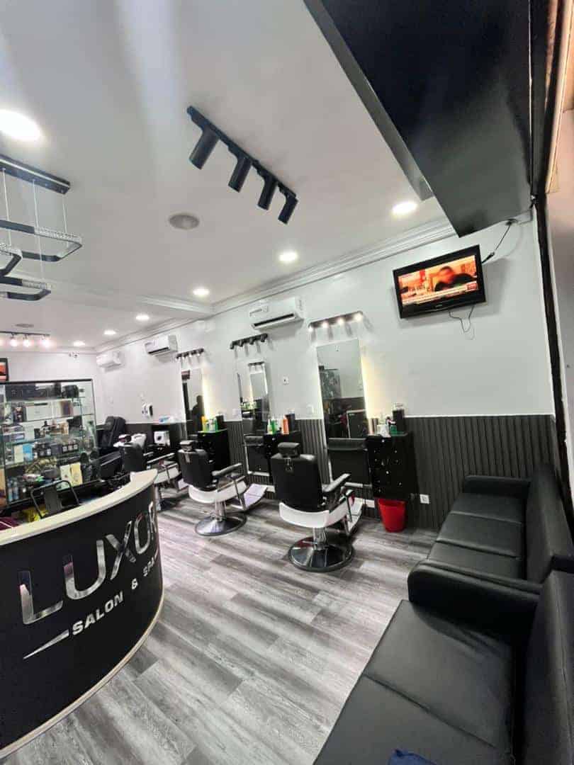Modern hair salon interior with styling chairs and mirrors
