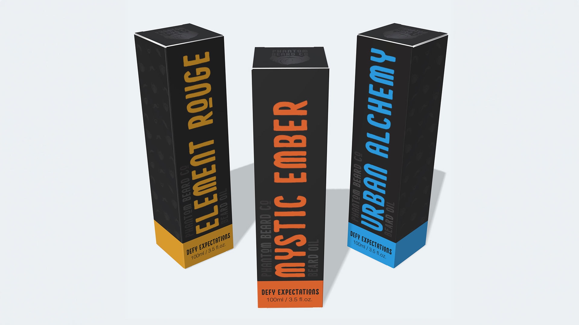 Phantom Beard Co 4 Three Phantom Beard Co. packaging boxes with bold typography in orange, blue, and yellow.