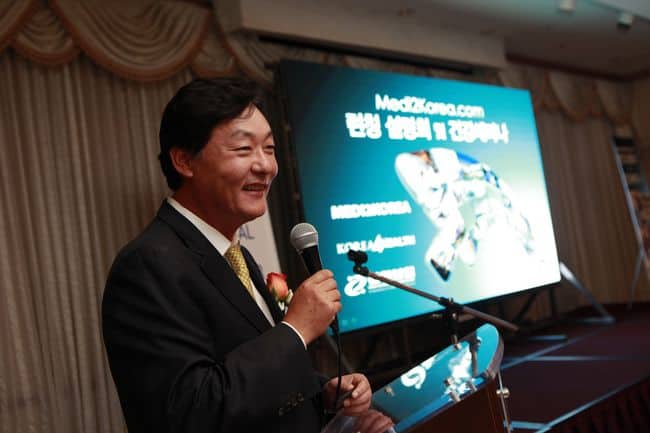 Medi2Korea members cutting the tape at their launch event on Tuesday in L.A. Koreatown.