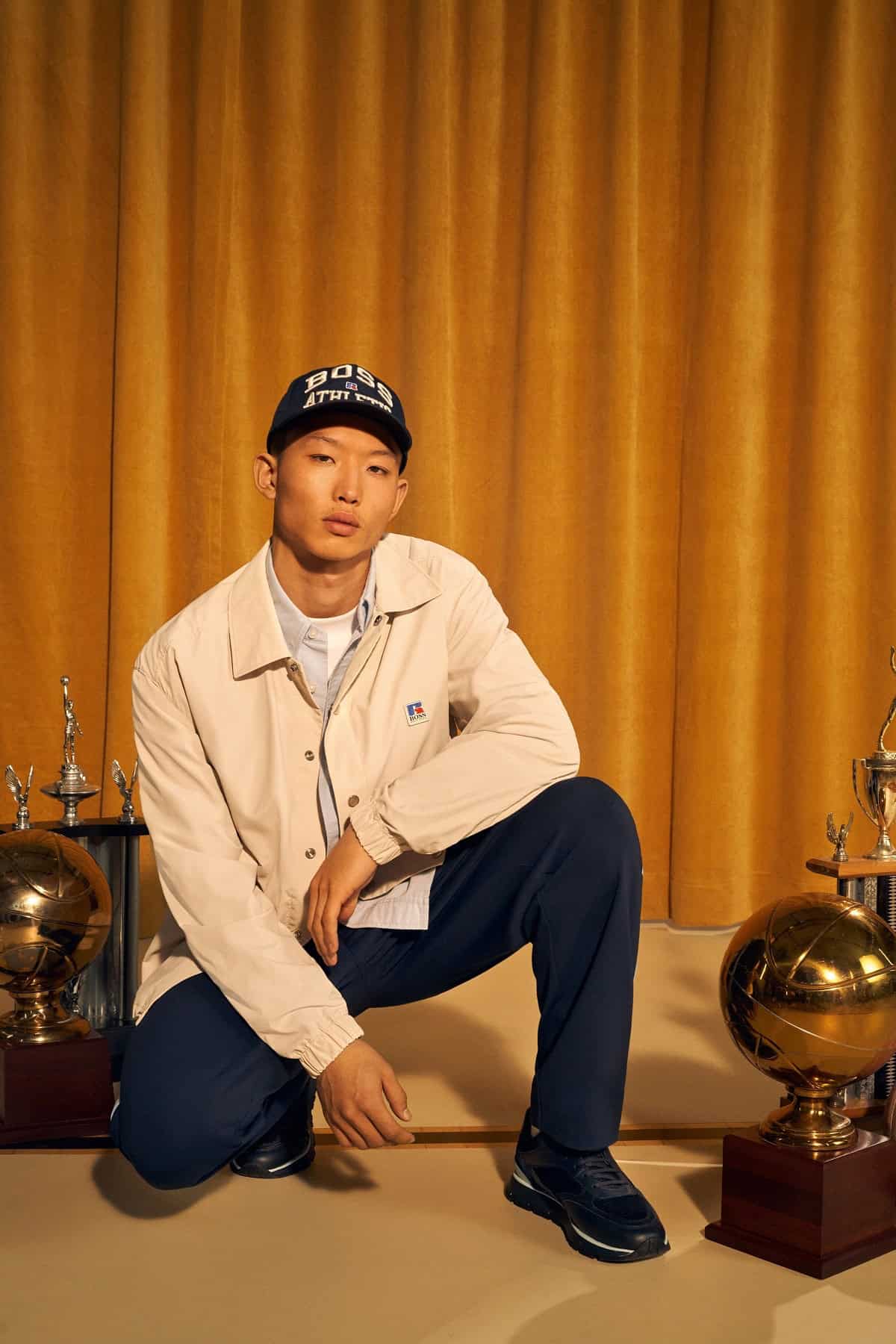 Boss x Russell Athletic model crouching