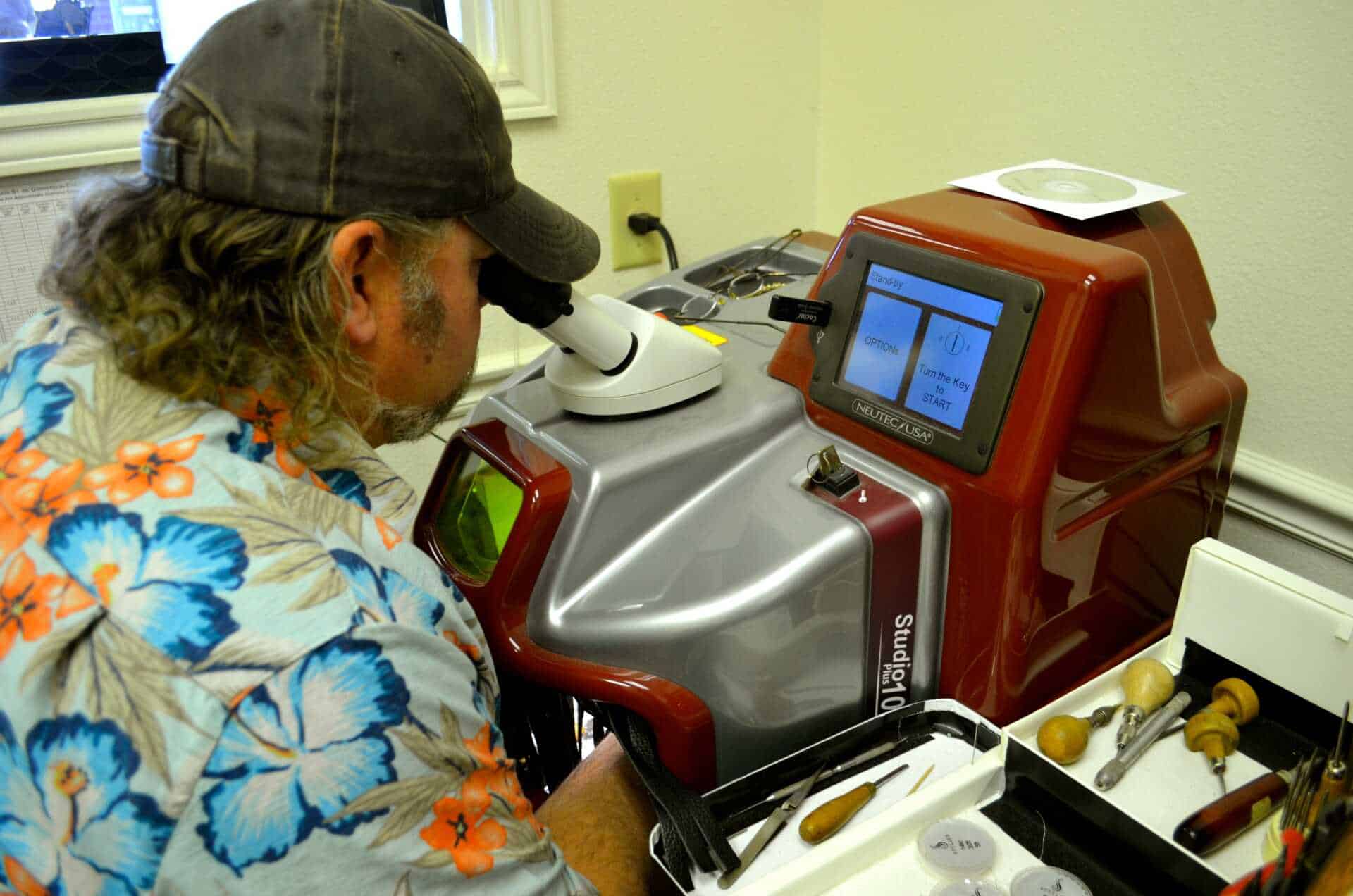 Our Artisan Jeweler, Steve Burrus, using our laser machine for jewelry repair.