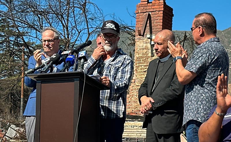Mel Gibson speaking at a press conference, supporting the Newsom recall campaign over wildfire mismanagement.