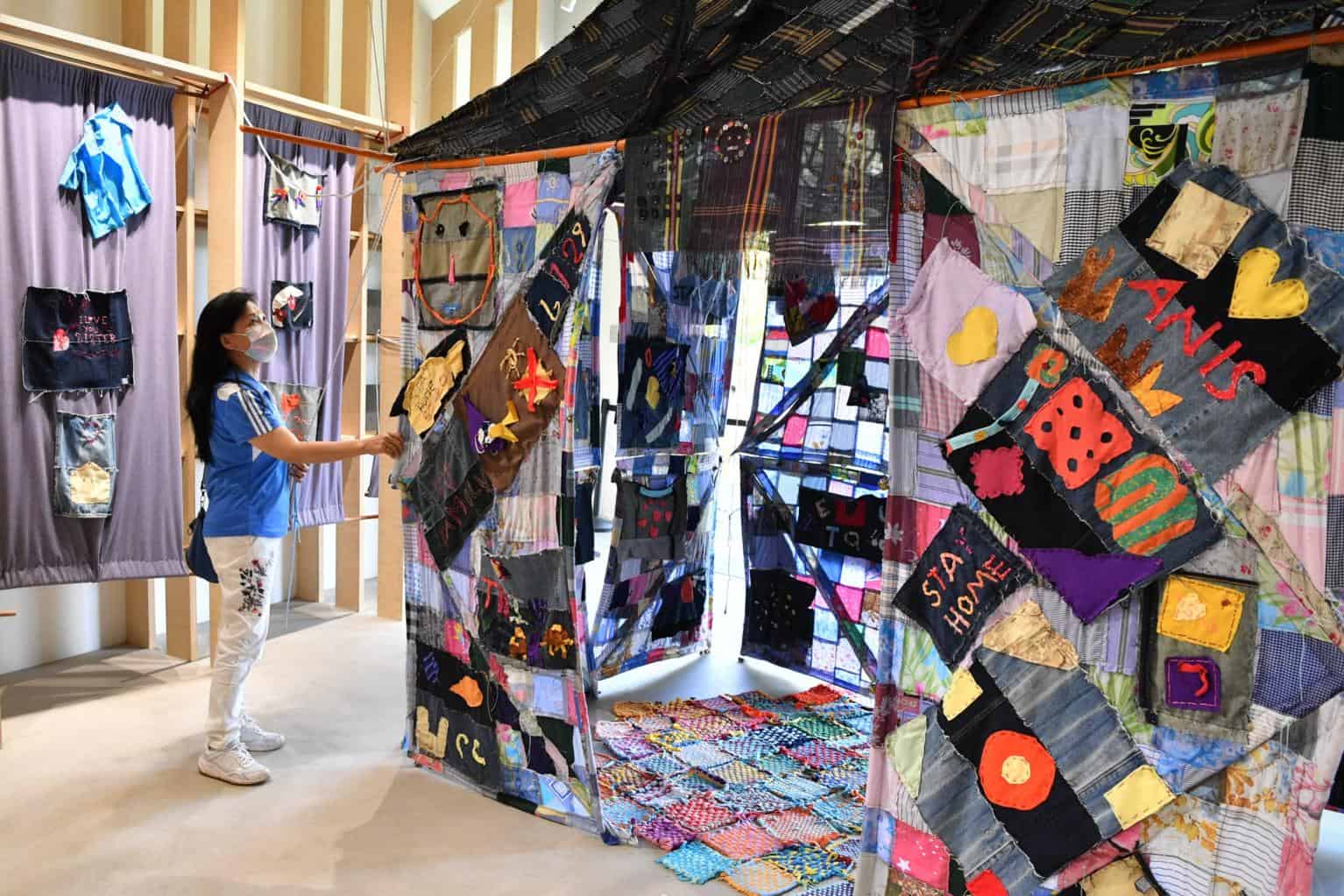 A visitor looking at the Stay Home Quilt at the Tzu Chi Humanistic Youth Centre on Dec 27, 2020. ST PHOTO: CHONG JUN LIANG
